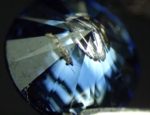 Metallic inclusions and color zoning in blue synthetic diamond