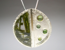 Quartz with epidote inclusions and green tourmalines