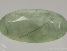 Hedembergite inclusions in quartz (prase quartz)