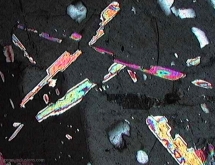 Protogenetic inclusions of mica particles in emeralds form the Urals, Russia.