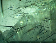 Ludwigite-vonsenite in peridot