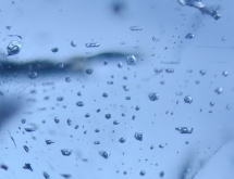 Two phase fluid inclusions in blue topaz