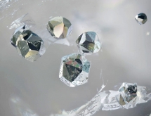 Combined pentagon dodecahedron pyrite crystals in quartz