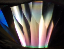 Iridiscent coating film on quartz