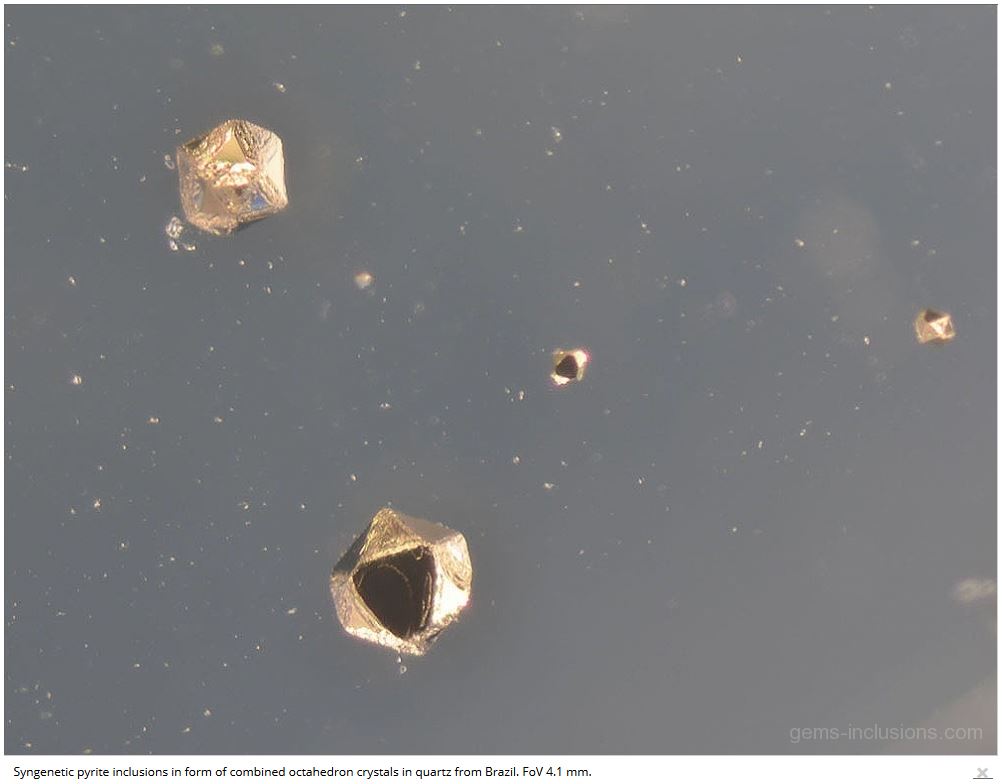 octahedron-pyrite-inclusions-quartz.JPG